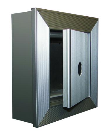 An anodized aluminum key keeper with a padded interior, designed for recessed installation, featuring a rough opening for locking a key.